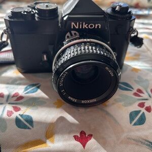 Nikon FE 35mm FILM SLR Camera with 50mm and 75-205 mm Lens